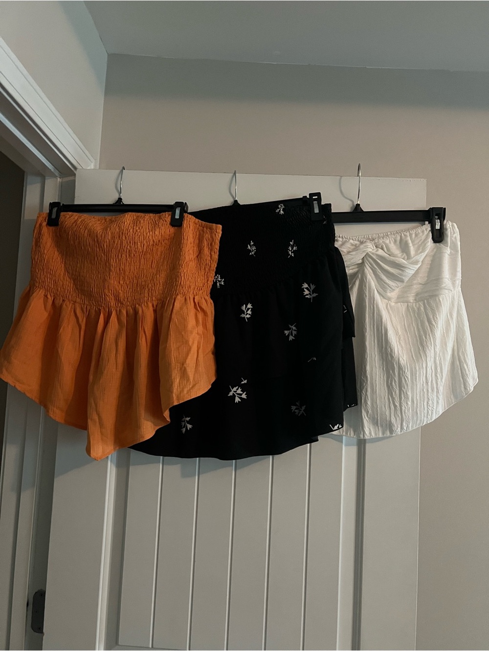 Three Women's Ruffle tube tops - Orange, Black Floral, White